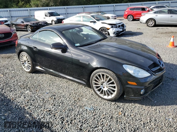 2009 Mercedes-Benz SLK-Class 3.0L with VIN WDBWK54F79F190128, listed as a Copart auction lot 80048934 with 32,354 mi miles and Salvage Title. Bid and sale history available at carsss.com. Image 4.