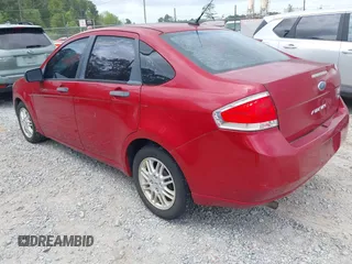 2011 Ford Focus SE with VIN 1FAHP3FN7BW189853, listed as a IAAI auction lot 42121843 with 98,921 mi miles. Bid and sale history available at carsss.com. Image 3.
