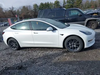 2023 Tesla Model 3 z VIN 5YJ3E1EAXPF543227, wystawiony jako IAAI lot #41150158 z przebiegiem 19 782 mil mil oraz . Historia ofert i sprzedaży dostępna na DreamBid. Obrazek 13.