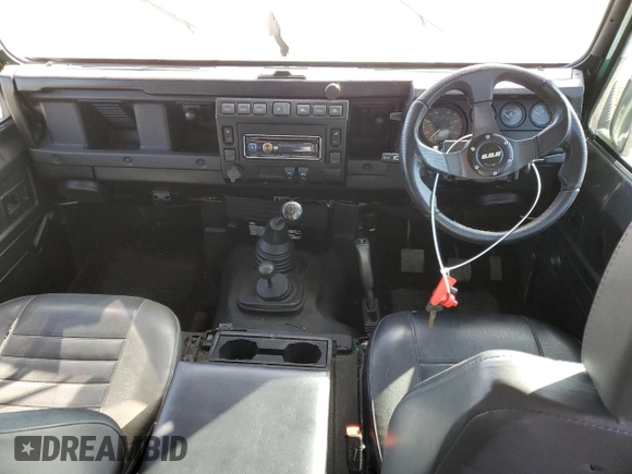 1999 Land Rover Defender with VIN SALLDHM87YA180832, listed as a Copart auction lot 49849015 with Not provided miles and Clean title. Bid and sale history available at DreamBid. Image 8.