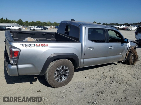 2023 Toyota Tacoma SR with VIN 3TMCZ5AN3PM645372, listed as a Copart auction lot 59917365 with 27,146 mi miles and Salvage title. Bid and sale history available at DreamBid. Image 3.