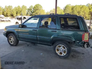 1998 Jeep Grand Cherokee Limited with VIN 1J4GZ78Y8WC261353, listed as a Copart auction lot 76605944 with 156,883 mi miles and Salvage Title. Bid and sale history available at carsss.com. Image 2.