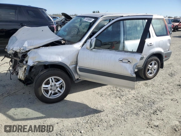 2000 Honda CR-V EX with VIN JHLRD1863YC002722, listed as a Copart auction lot 77416684 with 260,216 mi miles and Salvage Title. Bid and sale history available at carsss.com. Image 1.