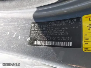 2012 BMW 6 Series 650i with VIN WBALZ3C5XCDL70748, listed as a IAAI auction lot 41762203 with 102,519 mi miles. Bid and sale history available at carsss.com. Image 9.