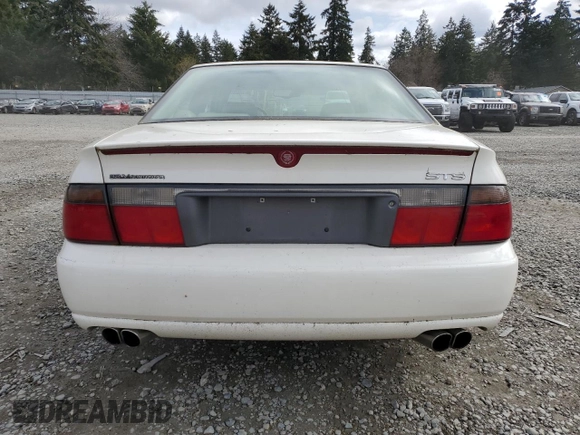 2000 Cadillac Seville Touring STS z VIN 1G6KY5497YU191639, wystawiony jako Copart lot #49658115 z przebiegiem 82 725 mil mil oraz Szkoda całkowita • Salvage title. Historia ofert i sprzedaży dostępna na DreamBid. Obrazek 6.