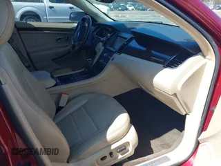 2013 Ford Taurus Limited with VIN 1FAHP2F80DG199576, listed as a IAAI auction lot 41759527 with 134,788 mi miles. Bid and sale history available at carsss.com. Image 5.