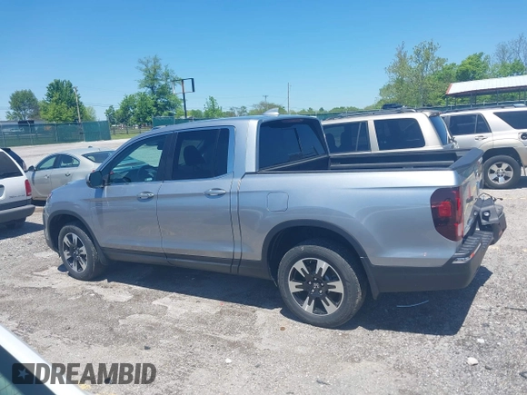 2020 Honda Ridgeline RTL with VIN 5FPYK3F5XLB019296, listed as a IAAI auction lot 42204290 with 48,197 mi miles and . Bid and sale history available at DreamBid. Image 14.