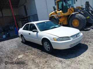 1997 Toyota Camry LE z VIN JT2BG22K3V0059784, wystawiony jako IAAI lot #42123909 z przebiegiem 185 649 mil mil oraz . Historia ofert i sprzedaży dostępna na DreamBid. Obrazek 1.