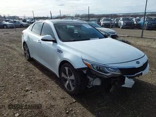 2019 Kia Optima LX with VIN 5XXGT4L31KG334865, listed as a IAAI auction lot 41044256 with 54,717 mi miles. Bid and sale history available at carsss.com. Image 1.