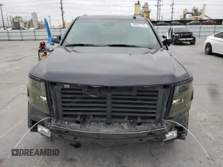 2019 Chevrolet Suburban LT z VIN 1GNSCHKCXKR143548, wystawiony jako Copart lot #54251715 z przebiegiem 102 804 mil mil oraz Szkoda całkowita • Salvage title. Historia ofert i sprzedaży dostępna na DreamBid. Obrazek 5.