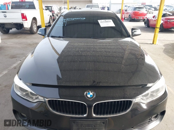 2015 BMW 4 Series 428i with VIN WBA4A9C52FGL85228, listed as a IAAI auction lot 41228043 with 152,729 mi miles and . Bid and sale history available at DreamBid. Image 12.