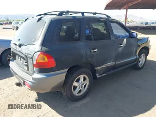 2004 Hyundai Santa Fe GLS with VIN KM8SC73E14U831372, listed as a IAAI auction lot 42297078 with 100,691 mi miles and . Bid and sale history available at DreamBid. Image 4.