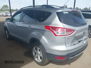 2013 Ford Escape SE with VIN 1FMCU0GX5DUB97293, listed as a IAAI auction lot 42044696 with 182,746 mi miles and . Bid and sale history available at DreamBid. Image 3.