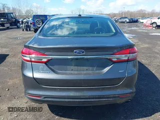 2017 Ford Fusion SE with VIN 3FA6P0H75HR401388, listed as a IAAI auction lot 41868407 with 147,102 mi miles and . Bid and sale history available at DreamBid. Image 16.