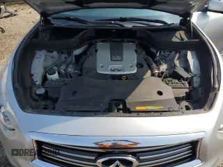 2014 Infiniti QX70 with VIN JN8CS1MW8EM411680, listed as a Copart auction lot 60350065 with 124,245 mi miles and Salvage title. Bid and sale history available at DreamBid. Image 12.