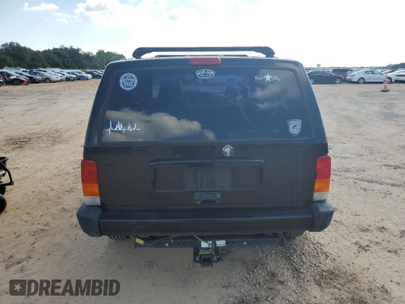 1997 Jeep Cherokee SE with VIN 1J4FJ28S6VL563756, listed as a Copart auction lot 74795074 with 196,118 mi miles and Salvage Title. Bid and sale history available at carsss.com. Image 6.