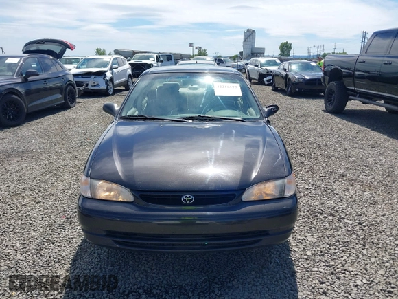 1999 Toyota Corolla VE z VIN 1NXBR12E9XZ205120, wystawiony jako IAAI lot #42216177 z przebiegiem 175 508 mil mil oraz . Historia ofert i sprzedaży dostępna na DreamBid. Obrazek 12.