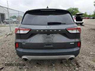 2020 Ford Escape SE z VIN 1FMCU0G64LUB91314, wystawiony jako Copart lot #58558185 z przebiegiem 78 251 mil mil oraz Szkoda całkowita • Salvage title. Historia ofert i sprzedaży dostępna na DreamBid. Obrazek 6.