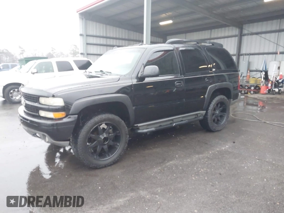 2003 Chevrolet Tahoe LT with VIN 1GNEK13Z73R176597, listed as a IAAI auction lot 41540553 with 275,042 mi miles. Bid and sale history available at carsss.com. Image 2.