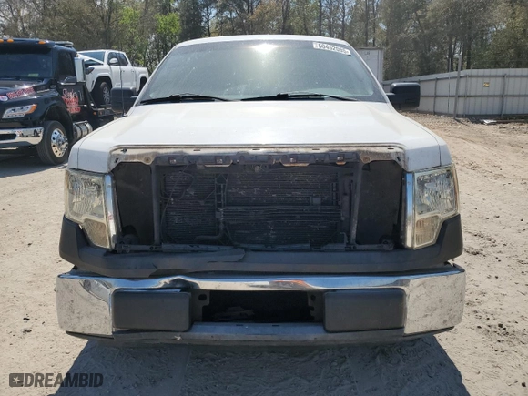 2011 Ford F-150 XL with VIN 1FTFW1CFXBKD24031, listed as a Copart auction lot 50452035 with 197,996 mi miles and Salvage Title. Bid and sale history available at carsss.com. Image 5.