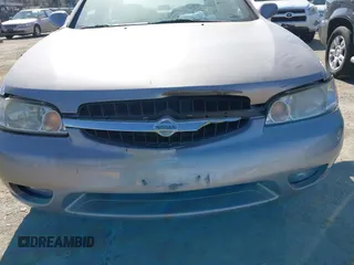 2000 Nissan Altima GXE with VIN 1N4DL01A9YC140466, listed as a IAAI auction lot 41605677 with 127,066 mi miles. Bid and sale history available at carsss.com. Image 6.