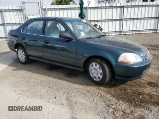1998 Honda Civic LX with VIN JHMEJ6673WS016828, listed as a Copart auction lot 73740904 with 80,801 mi miles and Salvage Title. Bid and sale history available at carsss.com. Image 4.