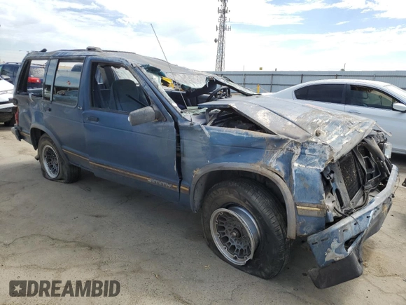 1994 GMC Jimmy SL z VIN 1GKCS13WXR0532905, wystawiony jako Copart lot #60670404 z przebiegiem 116 002 mil mil oraz Nie do naprawy. Historia ofert i sprzedaży dostępna na DreamBid. Obrazek 4.