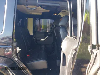 2015 Jeep Wrangler Unlimited Wrangler X with VIN 1C4BJWEG7FL677343, listed as a IAAI auction lot 42147411 with 105,920 mi miles and . Bid and sale history available at DreamBid. Image 8.