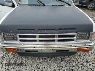 1990 Nissan Frontier with VIN 1N6SD16S9LC404281, listed as a Copart auction lot 84214904 with 279,270 mi miles and Salvage title. Bid and sale history available at DreamBid. Image 12.