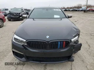 2018 BMW 5 Series M550i xDrive with VIN WBAJB9C56JB049524, listed as a Copart auction lot 43511805 with 55,759 mi miles and Salvage title. Bid and sale history available at DreamBid. Image 5.