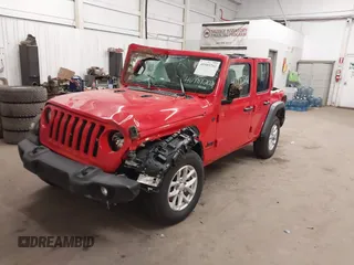 2023 Jeep Wrangler Sport S with VIN 1C4HJXDN1PW630003, listed as a IAAI auction lot 40989202 with 48,000 mi miles and . Bid and sale history available at DreamBid. Image 17.