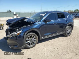 2021 Mazda CX-5 Signature with VIN JM3KFBEYXM0453766, listed as a Copart auction lot 45902795 with 26,066 mi miles and Salvage Title. Bid and sale history available at carsss.com. Image 1.