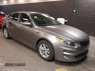2018 Kia Optima LX with VIN 5XXGT4L32JG230478, listed as a IAAI auction lot 41846109 with 101,577 mi miles. Bid and sale history available at carsss.com. Image 1.