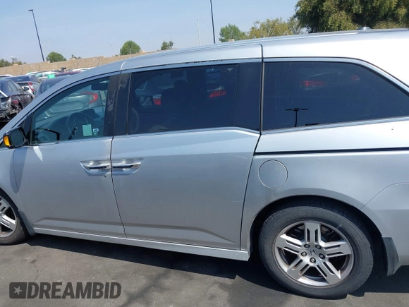 2012 Honda Odyssey Touring с VIN 5FNRL5H91CB004546, выставлен на аукционе IAAI как лот 42175002 с пробегом 118 719 миль миль и . История ставок и продаж доступна на DreamBid. Изображение 14.