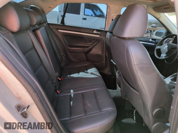 2009 Volkswagen Jetta SE с VIN 3VWRZ71K09M130230, выставлен на аукционе Copart как лот 54366605 с пробегом 143 655 миль миль и Списание • Salvage title. История ставок и продаж доступна на DreamBid. Изображение 10.