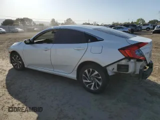 2016 Honda Civic EX with VIN 19XFC2F79GE241400, listed as a Copart auction lot 52260715 with 159,006 mi miles and Salvage Title. Bid and sale history available at DreamBid. Image 2.