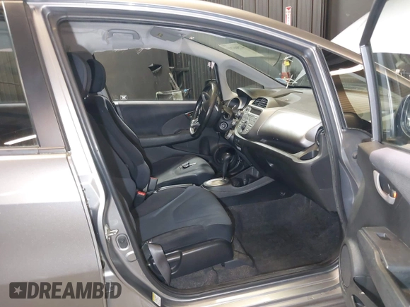 2010 Honda Fit Sport with VIN JHMGE8H43AC036091, listed as a IAAI auction lot 42566790 with 65,506 mi miles and . Bid and sale history available at DreamBid. Image 5.