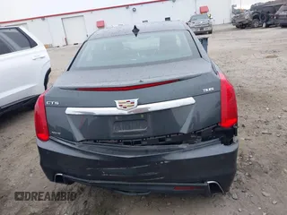 2018 Cadillac CTS Luxury AWD z VIN 1G6AX5SS6J0111510, wystawiony jako IAAI lot #41501384 z przebiegiem 68 315 mil mil oraz . Historia ofert i sprzedaży dostępna na DreamBid. Obrazek 16.