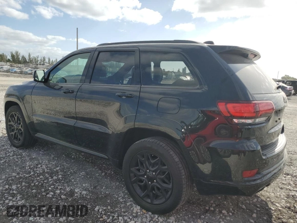 2021 Jeep Grand Cherokee 80th Anniversary z VIN 1C4RJEBG1MC844595, wystawiony jako Copart lot #54899195 z przebiegiem 19 287 mil mil oraz Szkoda całkowita • Salvage title. Historia ofert i sprzedaży dostępna na DreamBid. Obrazek 2.