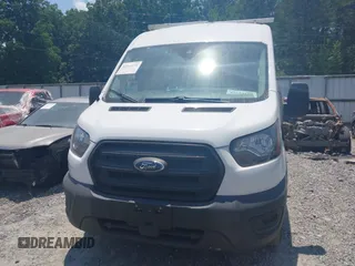 2020 Ford Transit Cargo z VIN 1FTBR1C8XLKB52205, wystawiony jako IAAI lot #42514128 z przebiegiem 103 583 mil mil oraz . Historia ofert i sprzedaży dostępna na DreamBid. Obrazek 12.