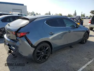 2022 Mazda 3 Premium with VIN JM1BPAML8N1511424, listed as a Copart auction lot 57108135 with 52,791 mi miles and Salvage title. Bid and sale history available at DreamBid. Image 3.