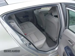 2010 Honda Insight LX with VIN JHMZE2H57AS008203, listed as a IAAI auction lot 42240869 with 150,562 mi miles and . Bid and sale history available at DreamBid. Image 8.
