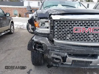 2016 GMC Sierra 2500HD Denali z VIN 1GT12UE81GF128498, wystawiony jako IAAI lot #41346398 z przebiegiem 164 532 mil mil oraz . Historia ofert i sprzedaży dostępna na DreamBid. Obrazek 19.