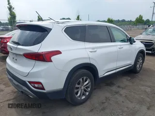 2019 Hyundai Santa Fe SE with VIN 5NMS23AD7KH111542, listed as a IAAI auction lot 42430502 with 78,755 mi miles and . Bid and sale history available at DreamBid. Image 4.