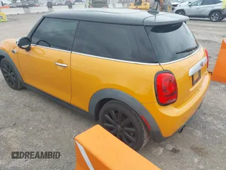 2015 MINI Hardtop with VIN WMWXM5C58FT942888, listed as a IAAI auction lot 42226391 with 61,935 mi miles and . Bid and sale history available at DreamBid. Image 3.
