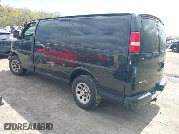 2012 Chevrolet Express Cargo Van with VIN 1GCSGAFX1C1202181, listed as a IAAI auction lot 42050001 with 167,854 mi miles. Bid and sale history available at carsss.com. Image 3.