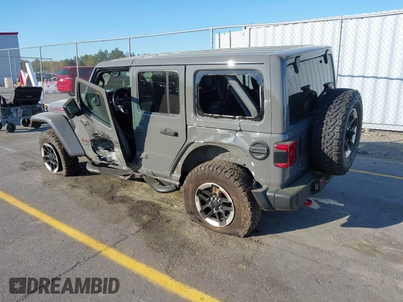 2020 Jeep Wrangler Unlimited Rubicon with VIN 1C4HJXFN4LW136516, listed as a IAAI auction lot 41874403 with 87,576 mi miles. Bid and sale history available at carsss.com. Image 3.