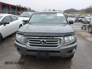 2012 Honda Ridgeline RT with VIN 5FPYK1F24CB456298, listed as a IAAI auction lot 40869948 with 123,329 mi miles and . Bid and sale history available at DreamBid. Image 12.