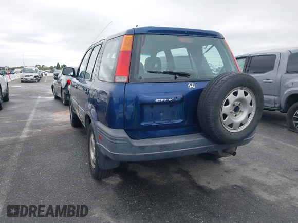 1999 Honda CR-V LX with VIN JHLRD1745XC014868, listed as a IAAI auction lot 41775272 with 212,835 mi miles. Bid and sale history available at carsss.com. Image 3.