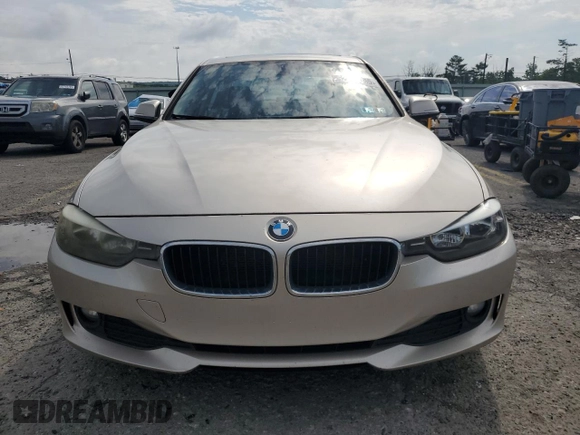 2013 BMW 3 Series 320i xDrive with VIN WBA3C3C50DF982982, listed as a Copart auction lot 62883045 with 189,875 mi miles and Clean title. Bid and sale history available at DreamBid. Image 5.